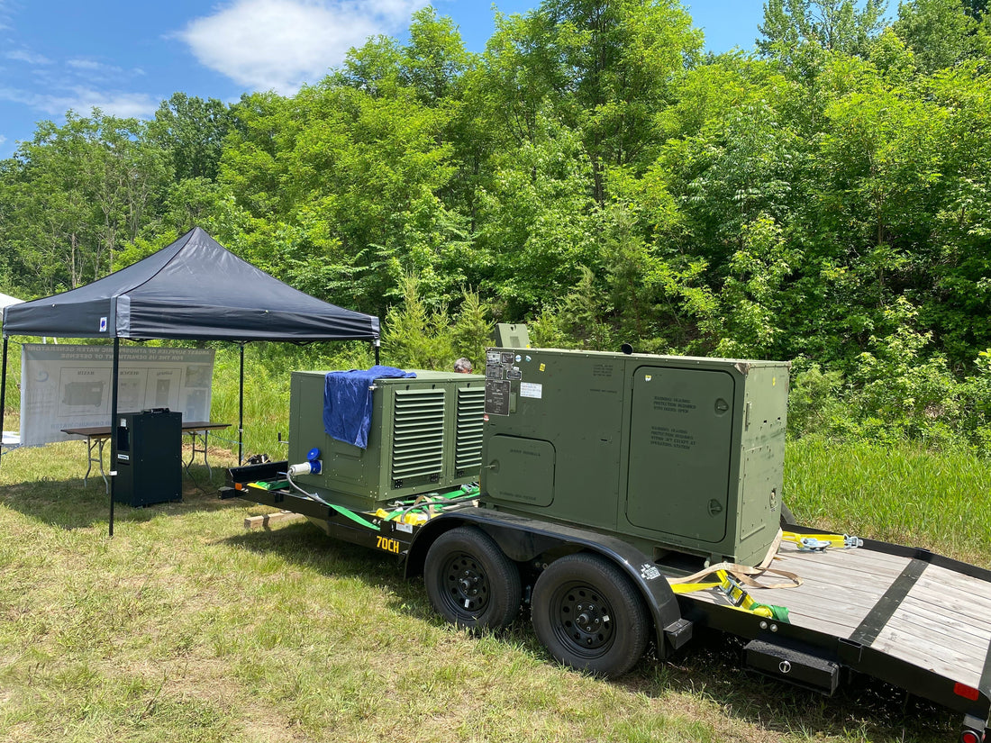 RussKap Water mobile Atmospheric Water Generation (AWG) trailer setup on display for U.S. military and Department of Defense.